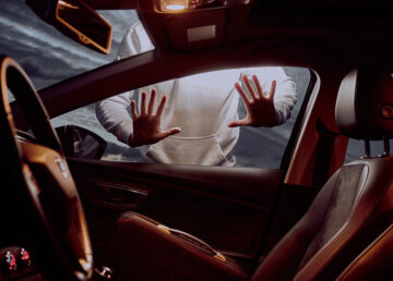 car theft - thief at car window - new york crime news
