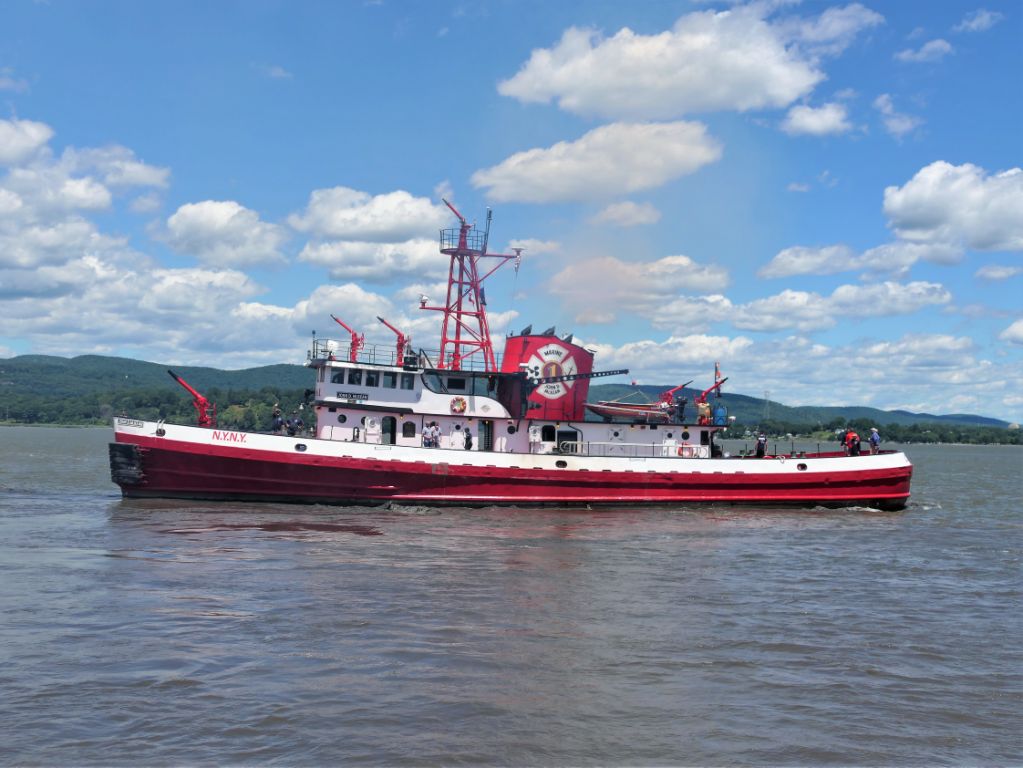 Historic fireboat peering out onto a dock on the Tarrytown waterfront